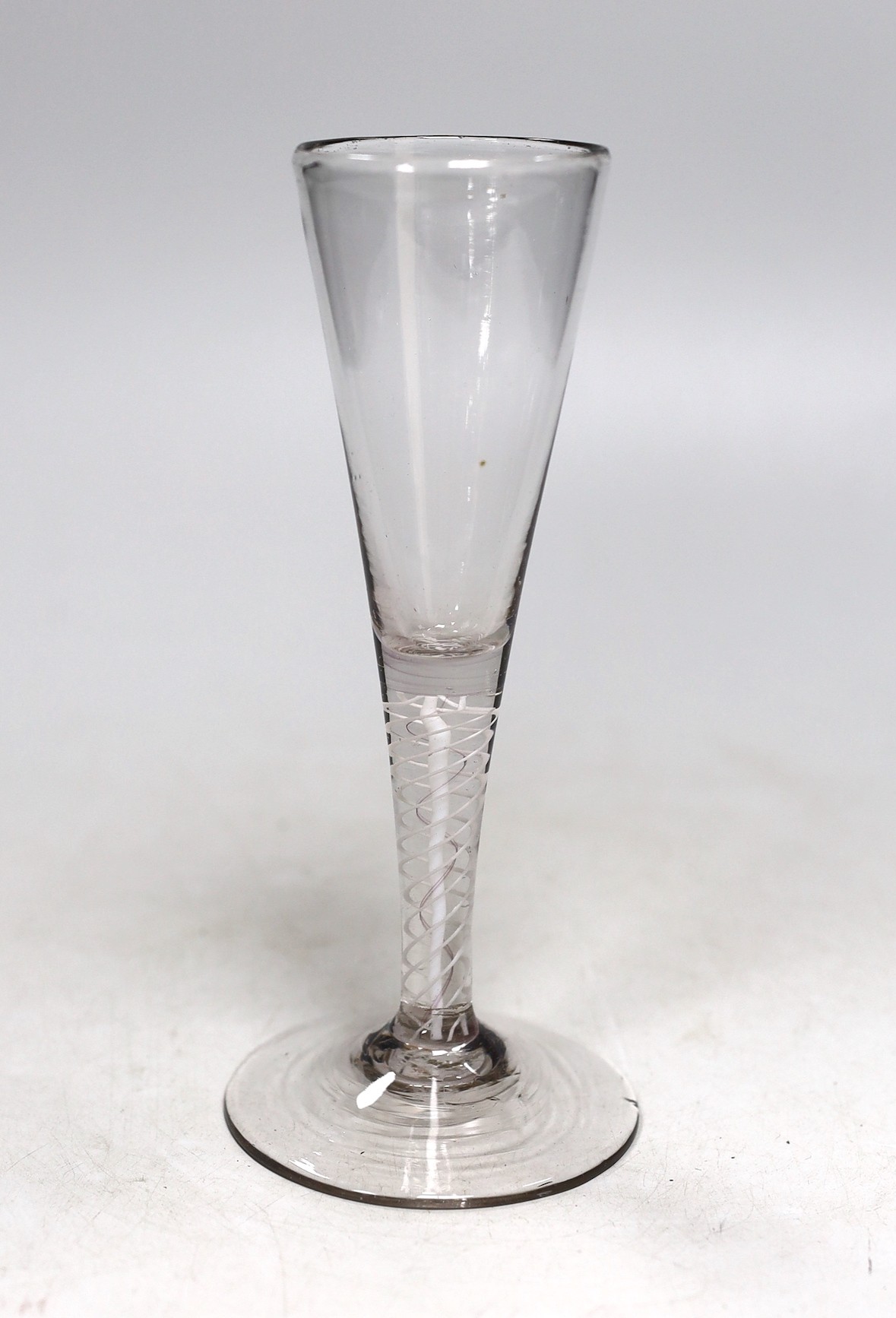 A George III DSOT stem ale flute. 19cm tall